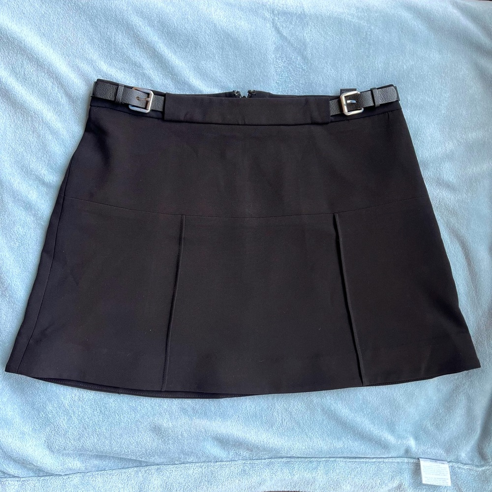 NWOT. Express black mini skirt. New. Never worn. Size 0.